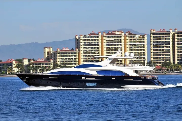 The Azimut 105 cruising past the Puerto Vallarta hotel zone