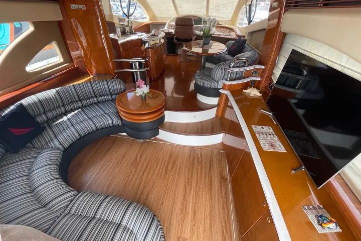 Curved salon seating aboard the Azimut 58 Fly