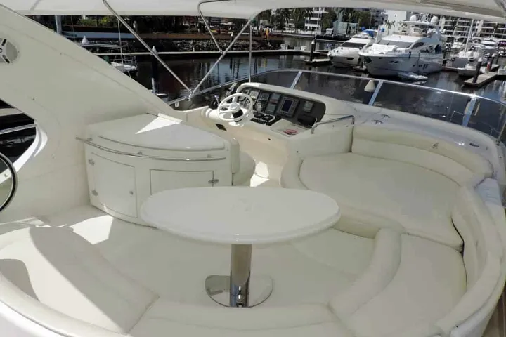 Cockpit seating with a table aboard the Azimut 58
