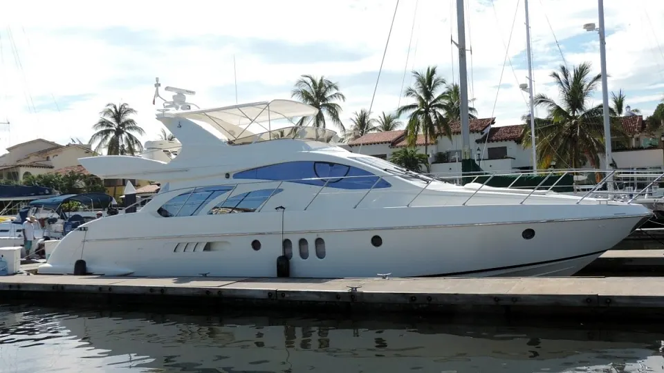 The Azimut 58 moored in a marina