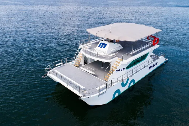 Catamaran 72 crossing calm water