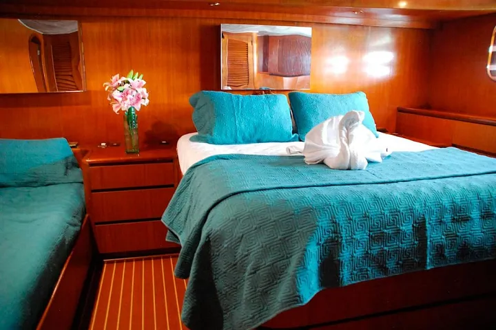 Cabin with a double bed aboard the Custom 90