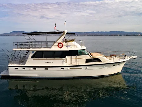 Hatteras 58 — classic flybridge yacht available for private charter