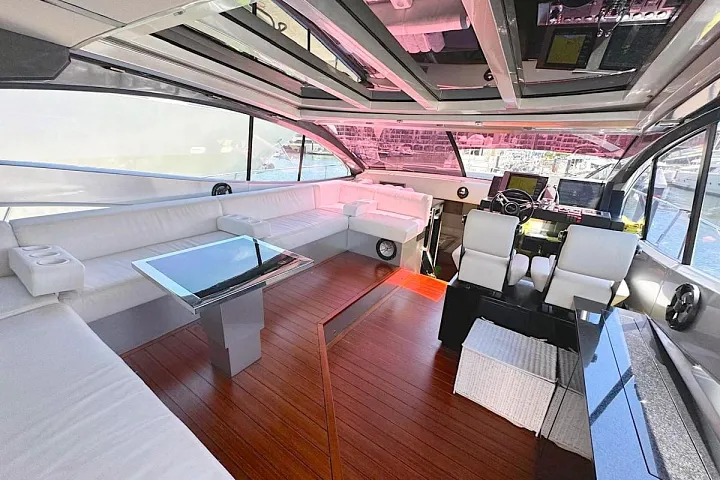 Helm and lounge area of the Rio 58